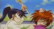 Poor Kenshin. He shouldn't have put the reds with the whites. Kaoru hates pink! Quite violent, considering it's only a kendo stick!